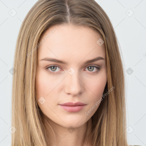 Neutral white young-adult female with long  brown hair and brown eyes