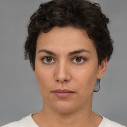 Neutral white young-adult female with short  brown hair and brown eyes