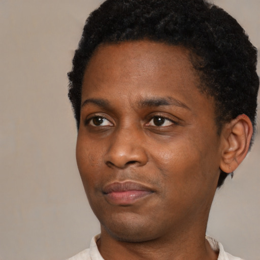 Neutral black adult male with short  black hair and brown eyes