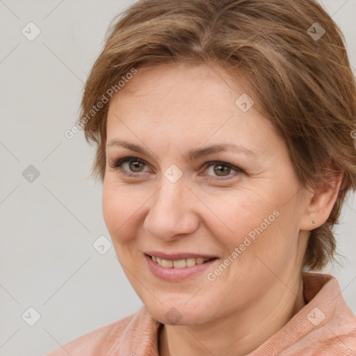 Joyful white adult female with medium  brown hair and brown eyes