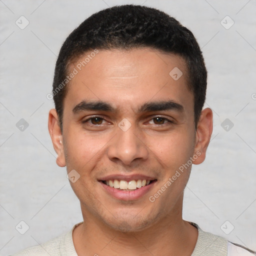 Joyful white young-adult male with short  black hair and brown eyes