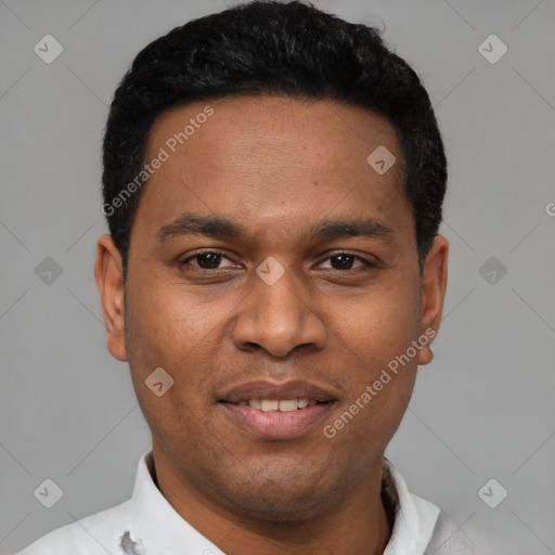 Joyful latino young-adult male with short  black hair and brown eyes