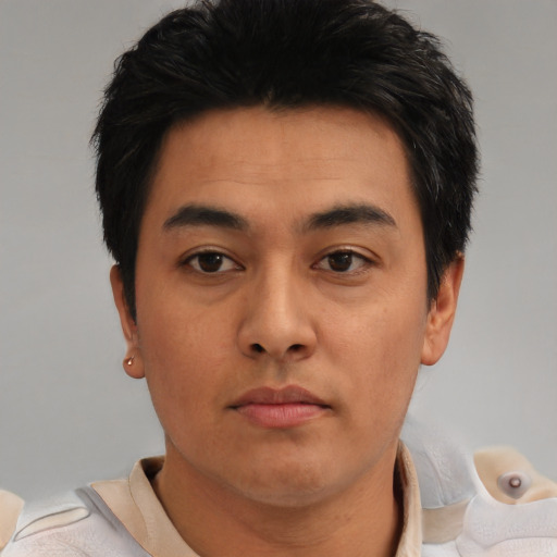 Neutral white young-adult male with short  black hair and brown eyes