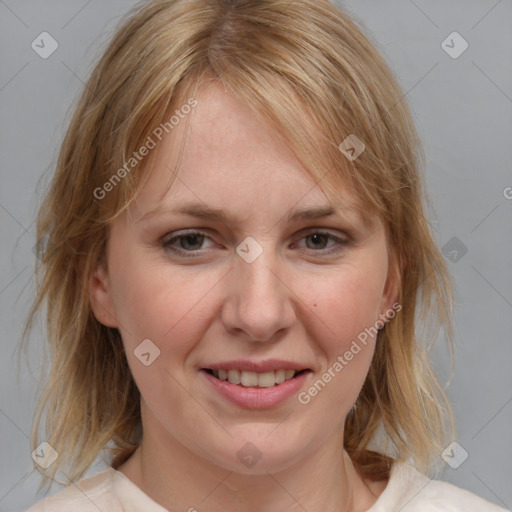 Joyful white young-adult female with medium  brown hair and blue eyes