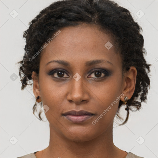 Neutral black young-adult female with short  brown hair and brown eyes