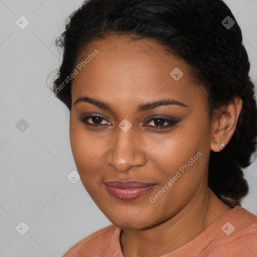 Joyful black young-adult female with short  black hair and brown eyes