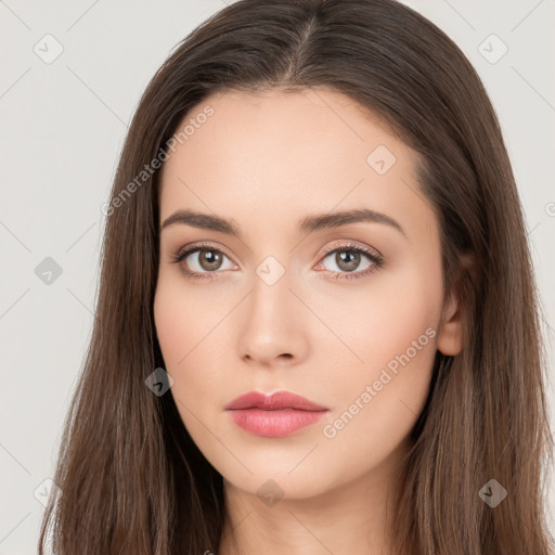 Neutral white young-adult female with long  brown hair and brown eyes