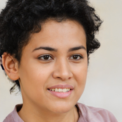 Joyful latino young-adult female with short  brown hair and brown eyes