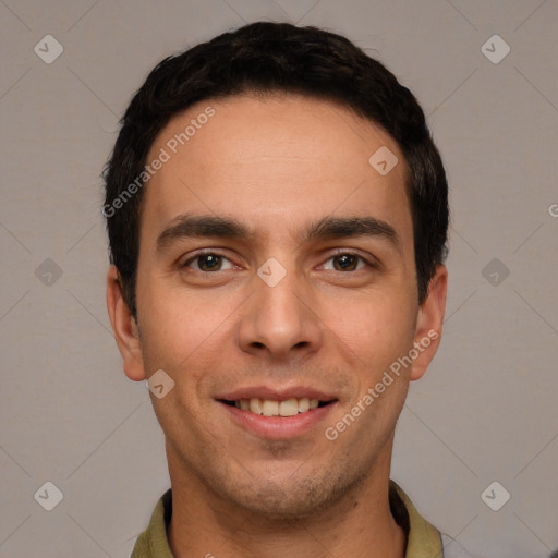 Joyful white young-adult male with short  black hair and brown eyes