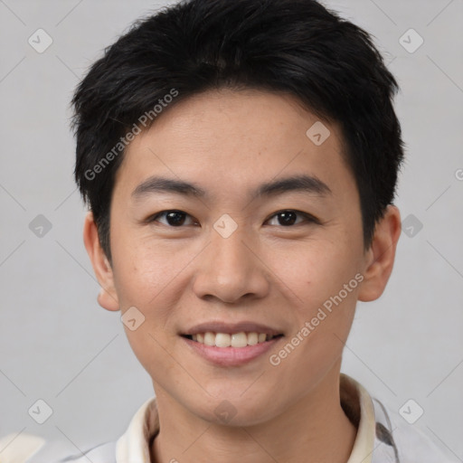 Joyful asian young-adult male with short  brown hair and brown eyes