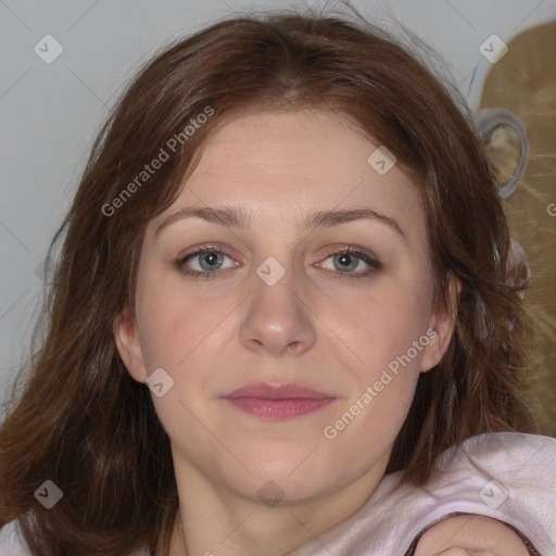 Joyful white young-adult female with medium  brown hair and blue eyes