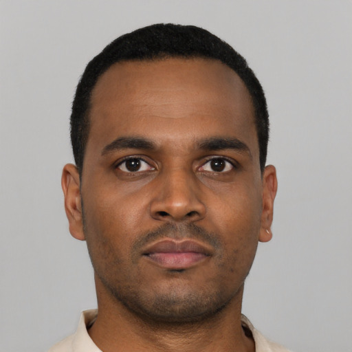 Neutral latino young-adult male with short  brown hair and brown eyes