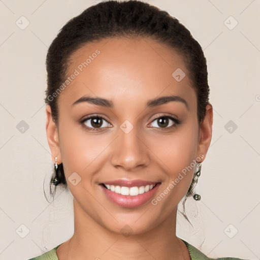 Joyful latino young-adult female with short  black hair and brown eyes