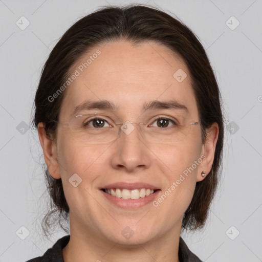 Joyful white adult female with medium  brown hair and brown eyes