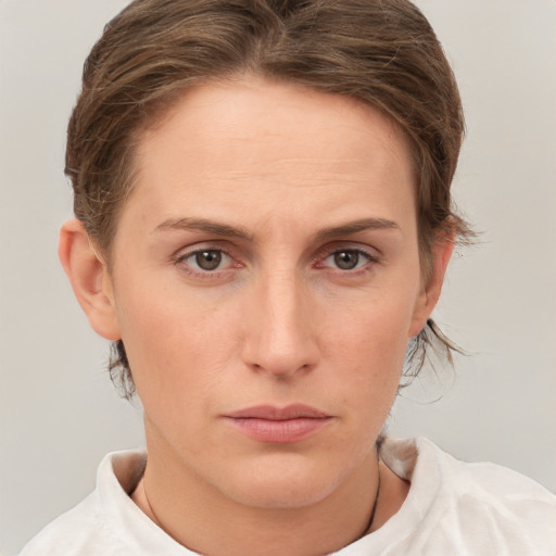 Neutral white young-adult female with short  brown hair and brown eyes