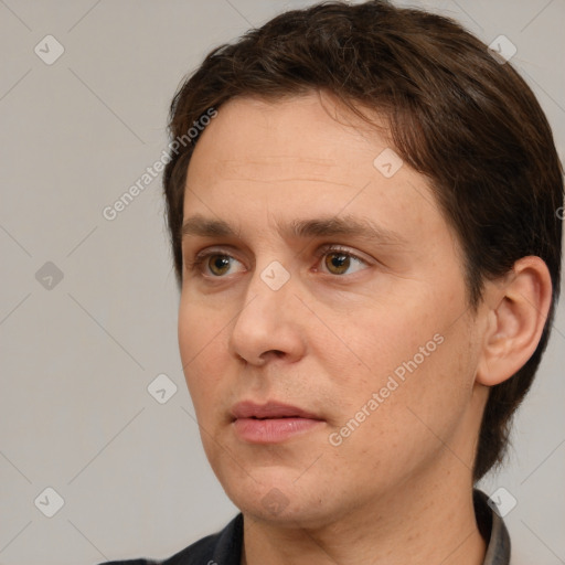 Neutral white adult male with short  brown hair and brown eyes