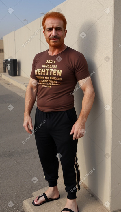 Iraqi middle-aged male with  ginger hair