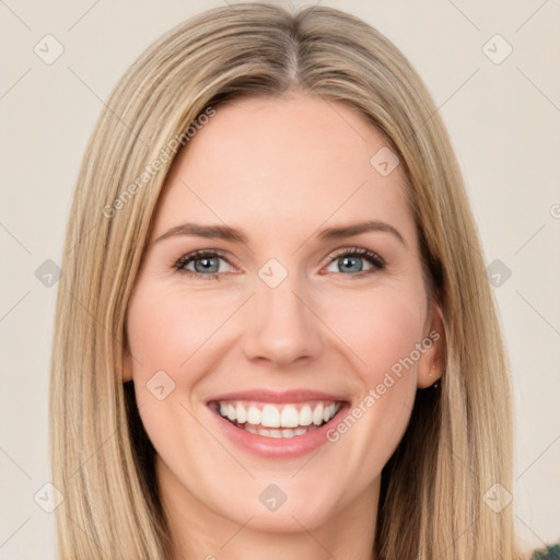 Joyful white young-adult female with long  brown hair and green eyes