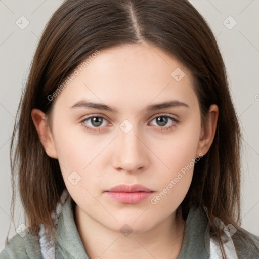 Neutral white young-adult female with long  brown hair and brown eyes