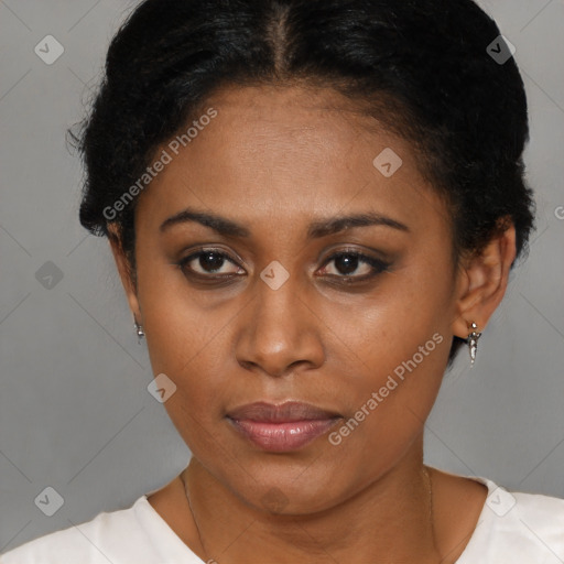 Joyful black young-adult female with short  brown hair and brown eyes