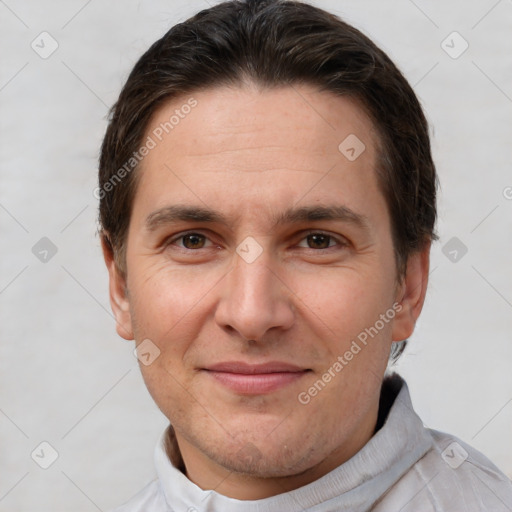 Joyful white adult male with short  brown hair and brown eyes