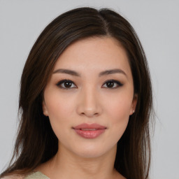 Neutral asian young-adult female with medium  brown hair and brown eyes