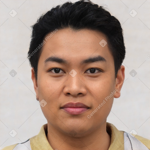 Joyful asian young-adult male with short  black hair and brown eyes