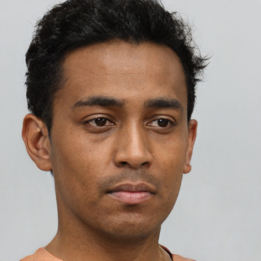 Neutral black young-adult male with short  brown hair and brown eyes