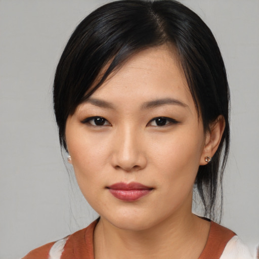 Neutral asian young-adult female with medium  black hair and brown eyes