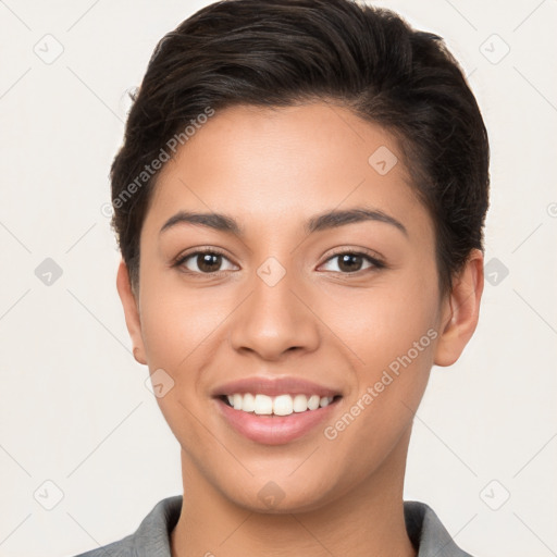 Joyful white young-adult female with short  brown hair and brown eyes