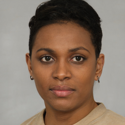 Neutral latino young-adult female with short  black hair and brown eyes