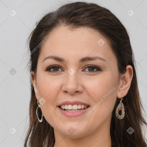 Joyful white young-adult female with long  brown hair and grey eyes