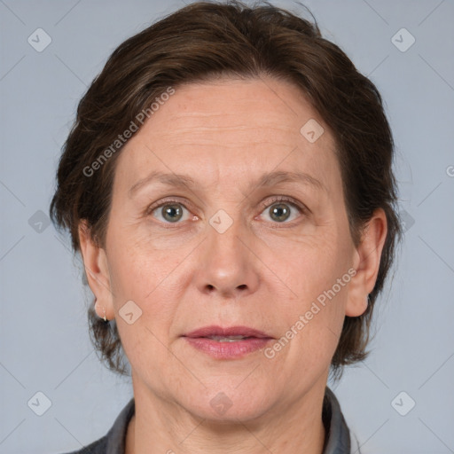 Joyful white adult female with medium  brown hair and grey eyes