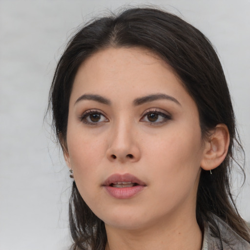 Neutral asian young-adult female with long  black hair and brown eyes