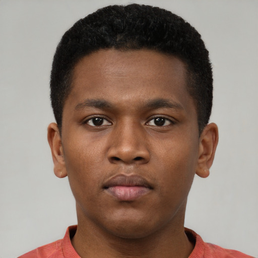 Neutral black young-adult male with short  brown hair and brown eyes