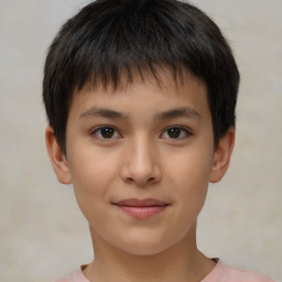 Joyful white child male with short  brown hair and brown eyes
