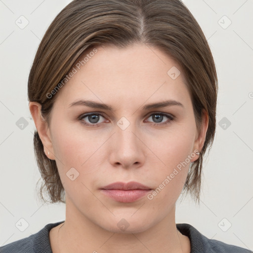 Neutral white young-adult female with medium  brown hair and grey eyes