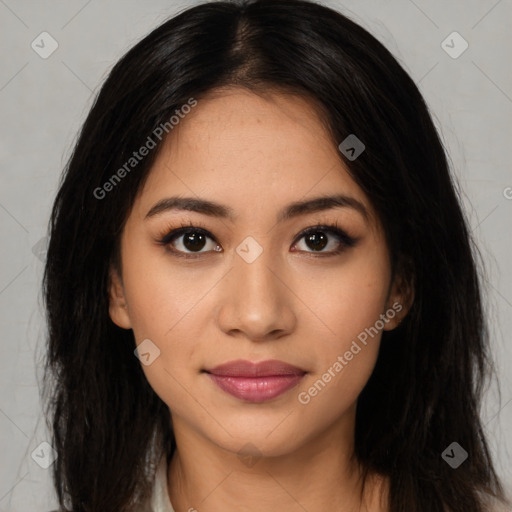 Joyful latino young-adult female with long  black hair and brown eyes