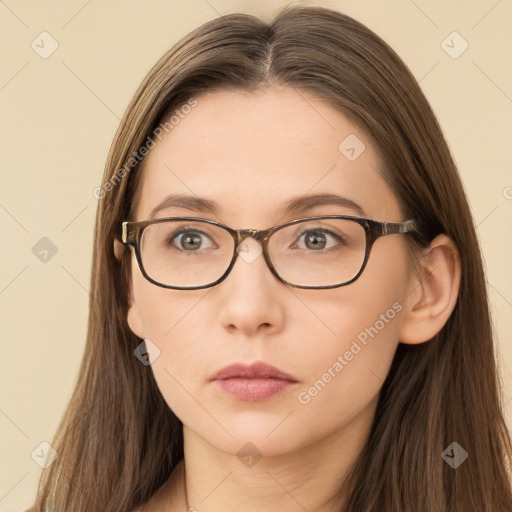 Neutral white young-adult female with long  brown hair and brown eyes