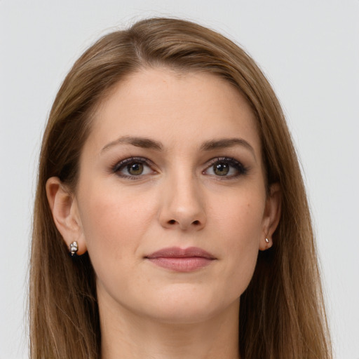 Joyful white young-adult female with long  brown hair and grey eyes