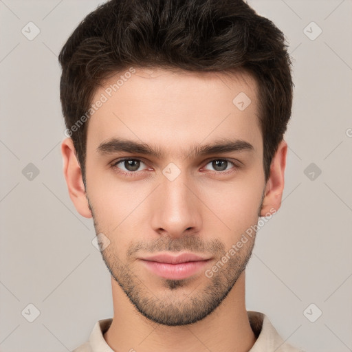 Neutral white young-adult male with short  brown hair and brown eyes