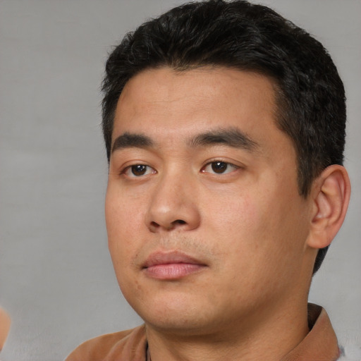 Neutral asian young-adult male with short  black hair and brown eyes