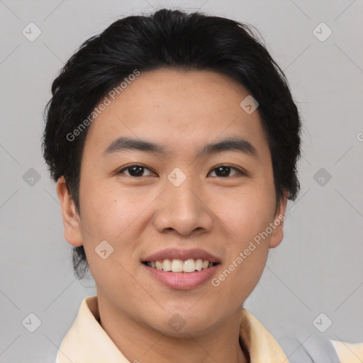 Joyful asian young-adult male with short  black hair and brown eyes