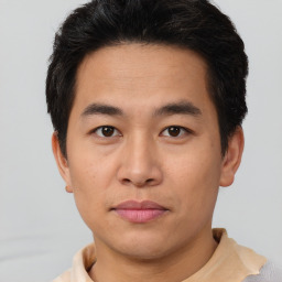 Neutral asian young-adult male with short  brown hair and brown eyes