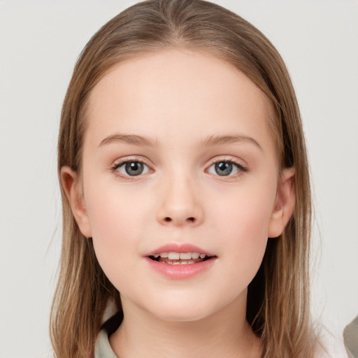 Joyful white child female with medium  brown hair and brown eyes