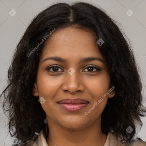 Joyful black young-adult female with medium  brown hair and brown eyes