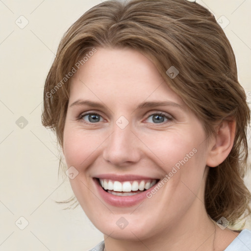 Joyful white young-adult female with medium  brown hair and green eyes