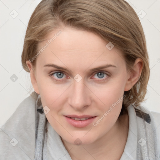 Joyful white young-adult female with medium  brown hair and blue eyes