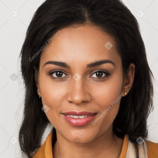 Joyful latino young-adult female with long  brown hair and brown eyes