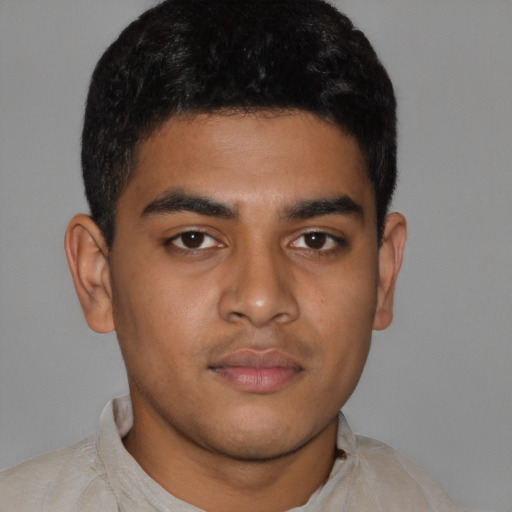 Neutral latino young-adult male with short  black hair and brown eyes